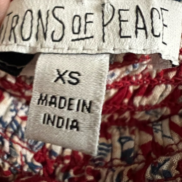 Patrons of Peace cropped blouse with poofy sleeves, smocking, and peplum. XS - Picture 7 of 8